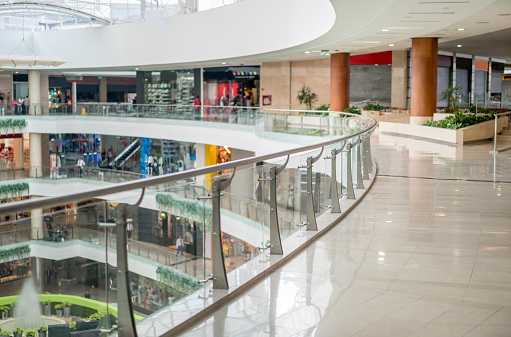 Andorra la Vella, Andorra, Jan 2020 Family, people shopping in multi floor shopping mall or a gallery in a capital city. Pyrenees Mountains