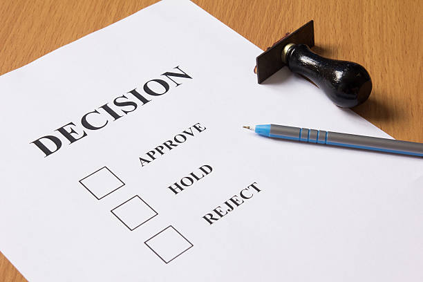 istock Decision paper (approve, hold, reject) with pen, rubber stamp 615426872