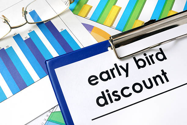 istock Paper with words Early bird discount and charts. 615426894