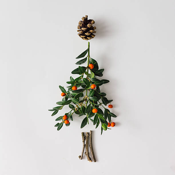 istock Christmas tree made of leaves and berries 615427800