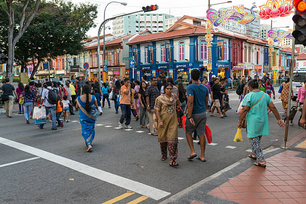 Pedestrians Crossing The Road at Little India, Singapore stock photo