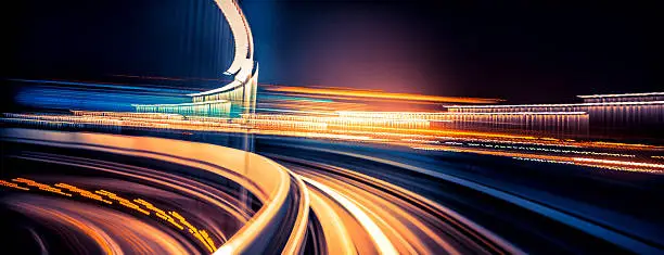 abstract motion-blurred view from the front of a train in Tokio, Japan