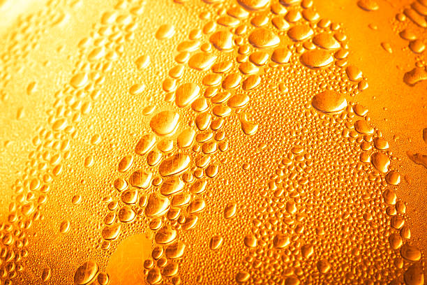istock Drops of water on a glass background. Selective focus. Toned 615429364