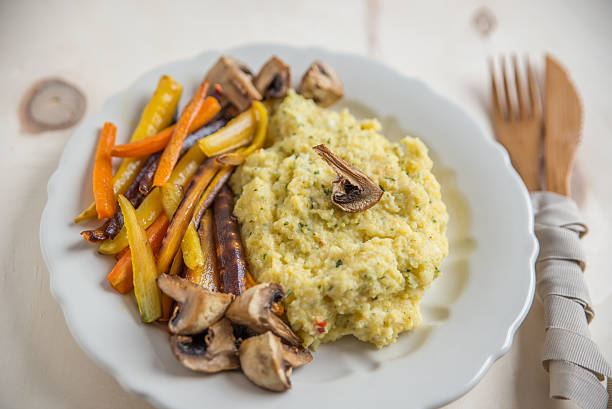 istock Creamy polenta with roasted vegetables 615429740