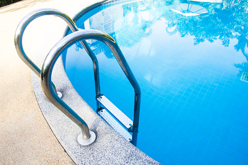  swimming pool with steel ladder.