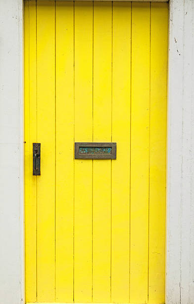 istock Yellow wooden Door 615430418