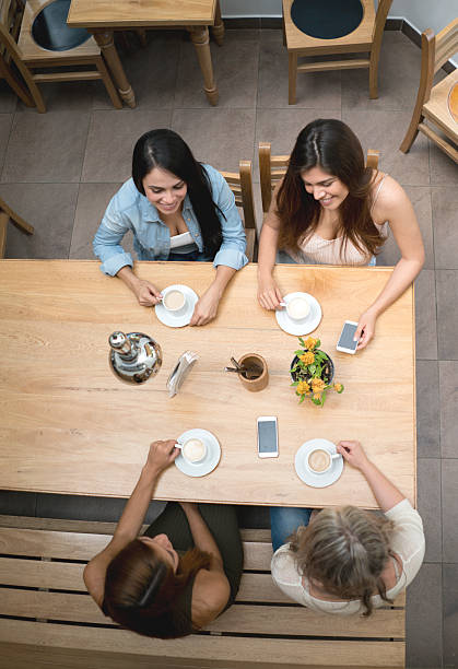 istock Group of friends at a coffee shop 615432120