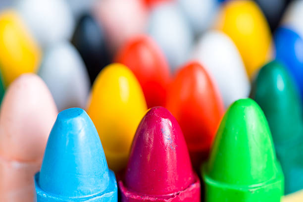 istock Rainbow of pencil crayons - macro 615477998
