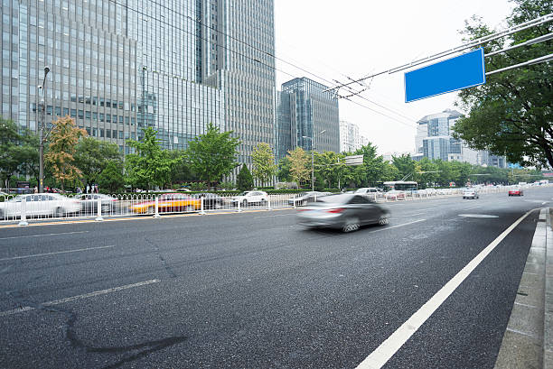 istock modern city road and building 615481052