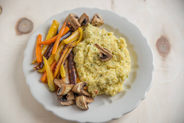 istock Creamy polenta with roasted vegetables 615482674