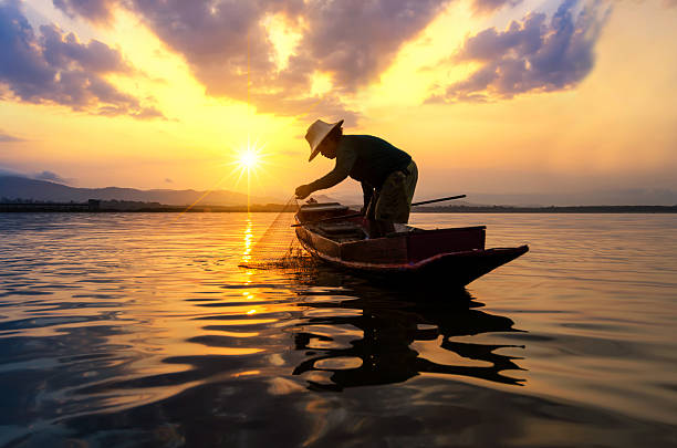istock Asian fisherman 615482738