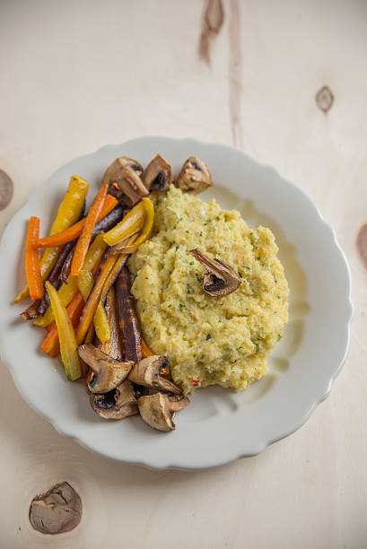istock Creamy polenta with roasted vegetables 615483456