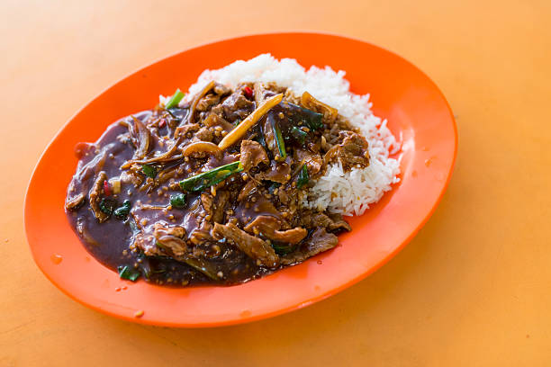 Black Pepper Beef with Rice - Local Food of Singapore stock photo