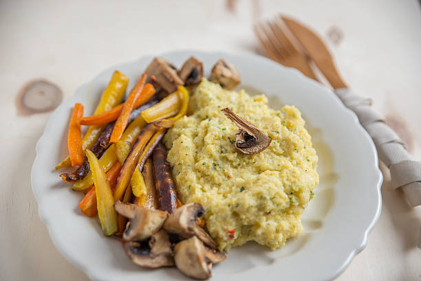 istock Creamy polenta with roasted vegetables 615483702