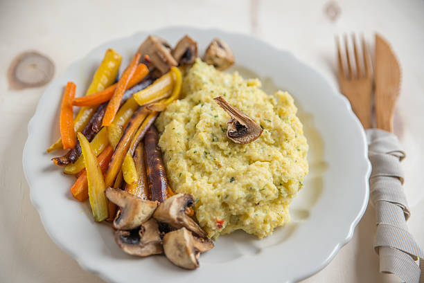 istock Creamy polenta with roasted vegetables 615483848