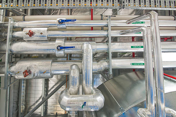 High Level Pipework and Services in Plantroom stock photo