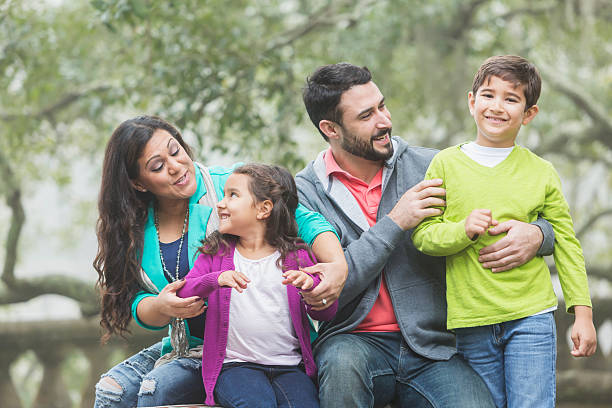 istock Hispanic family with two children 615484826