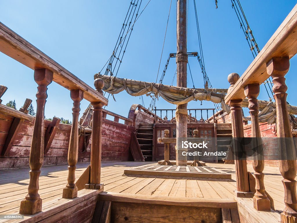 Aged sailing ship on ashore Deck of a shipwrecked forgotten sailing ship Boat Deck Stock Photo