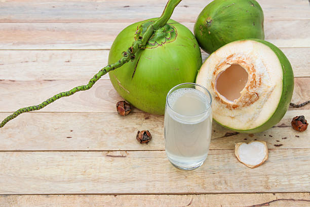 Fresh Coconut Water Drink  on wooden  background