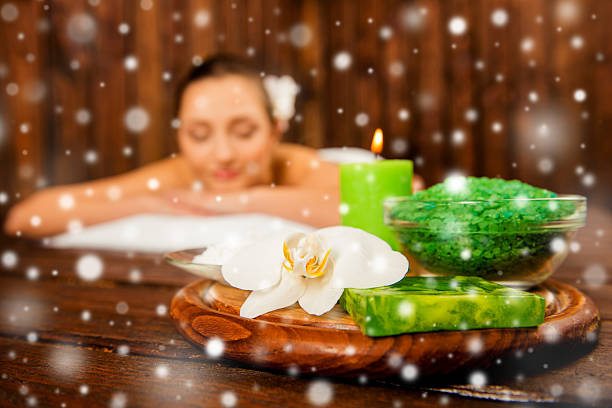 istock Pretty calm woman lying on aromatherapy, new year concept 615487820
