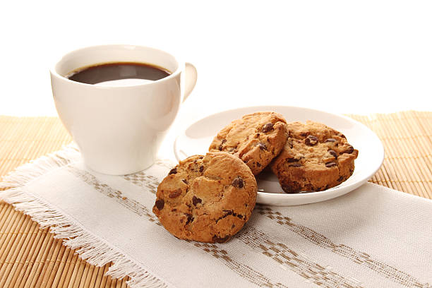 istock Chocolate cookies and a cup of coffee 615487864