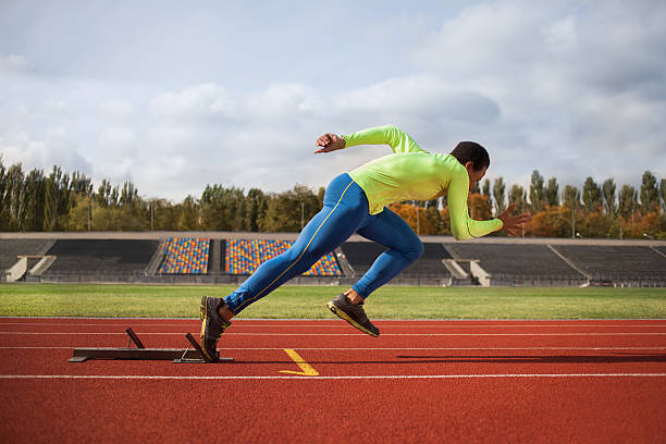 istock Running african man at stadium 615488472