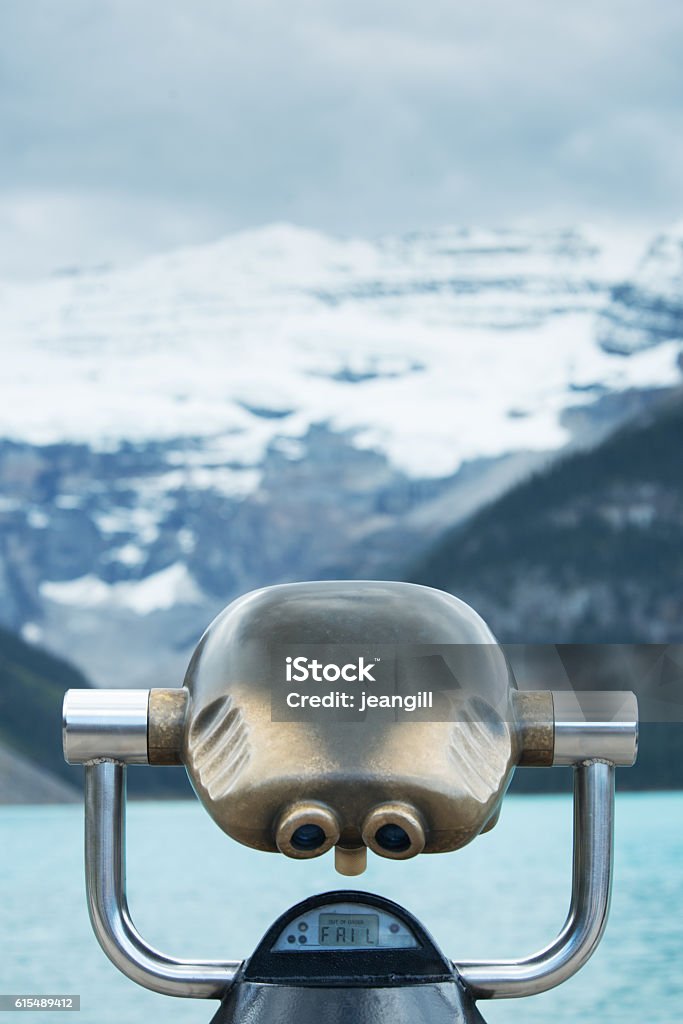 FAIL message on Lake Louise  binoculars, Canadian Rockies FAIL message on Lake Louise  binoculars, Canadian Rockies. Humorous concept, re failure, fame, travel and machinery. You travel all that way and what do you find? Could be used by accident and insurance companies to highlight machinery breaking down. Binoculars Stock Photo