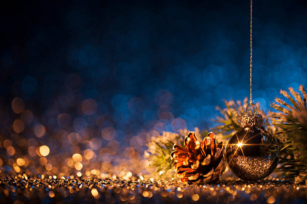 Christmas ornaments on defocused lights. Decorations Bokeh Blue Gold stock photo