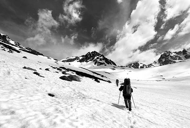 istock Two hikers in snow plateau 615493790