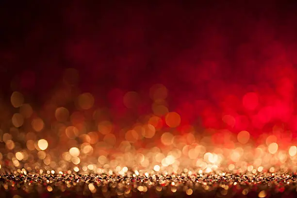 Defocused golden and red christmas lights.