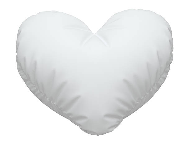 primer plano de una fuente de almohada blanca. - heart shape pillow cushion textile fotografías e imágenes de stock