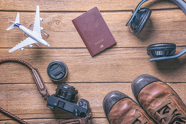 istock Travel accessories and costume on table . traveling concept 615495968