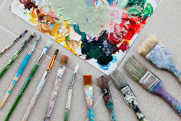 istock Brushes with palette in the creative background. Colorful element. 615496030