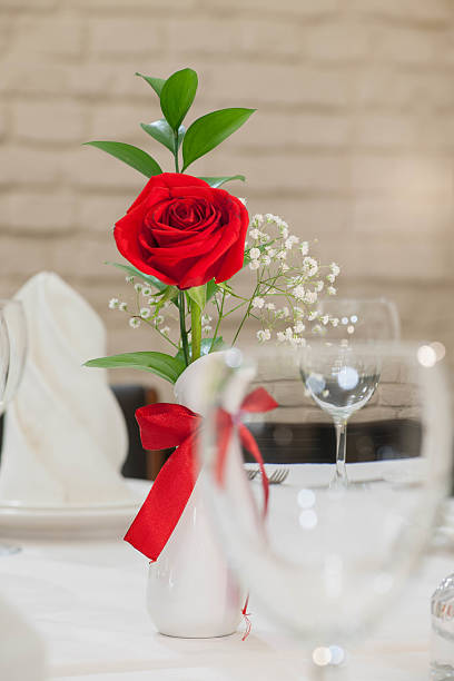 istock flowers in a vase on a festive table 615497878