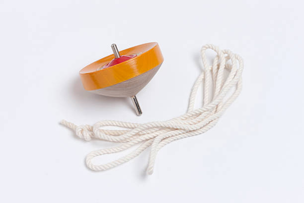 Top And String 440+ Spinning Top With String Stock Photos, Pictures & Royalty-Free ...