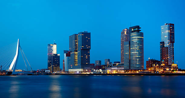 istock Rotterdam, Skyline Illuminated at Dusk, Netherlands, Panoramic View 615499278