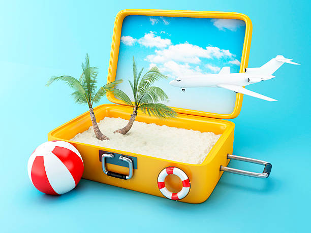istock Travel suitcase. beach vacation concept 615500950