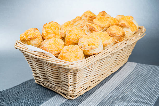 istock Hungarian Cheese Scones or Pogacsa in a Basket 615507274