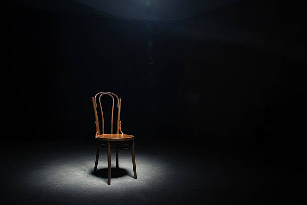 istock Lonely chair at the empty room 615508642