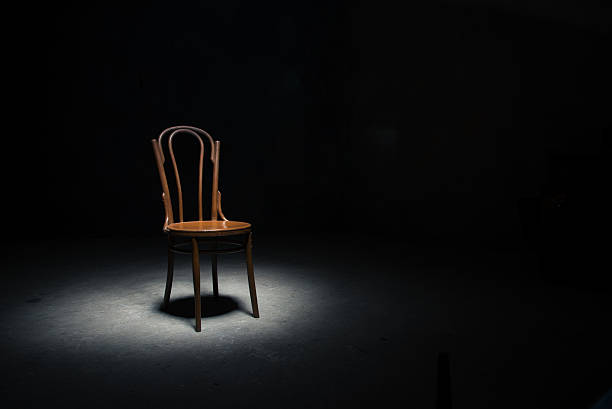 istock Lonely chair at the empty room 615508724