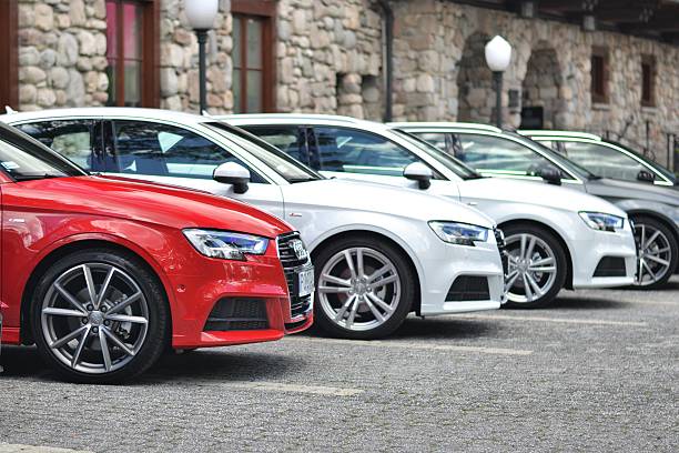Audi vehicles on the parking Zakopane, Poland - July 4th, 2016: The Audi A3 vehicles stopped on the parking during the presentation. These vehicles are the ones of the most popular premium cars in the world. ingolstadt photos stock pictures, royalty-free photos & images