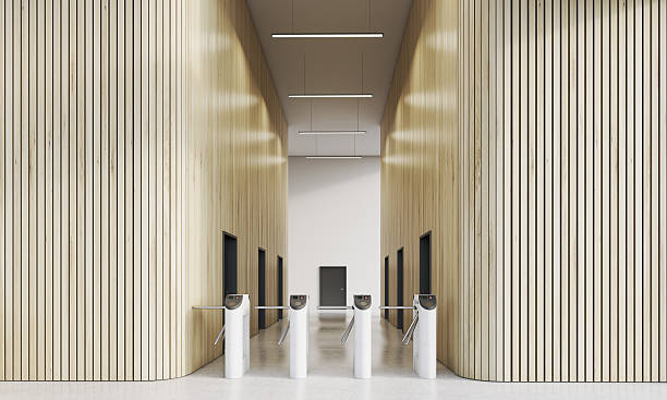 istock Turnstiles in office with wooden walls 615511284