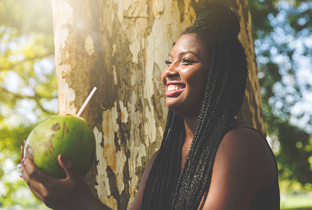 istock Afro young girl chilling out in the park 615511334