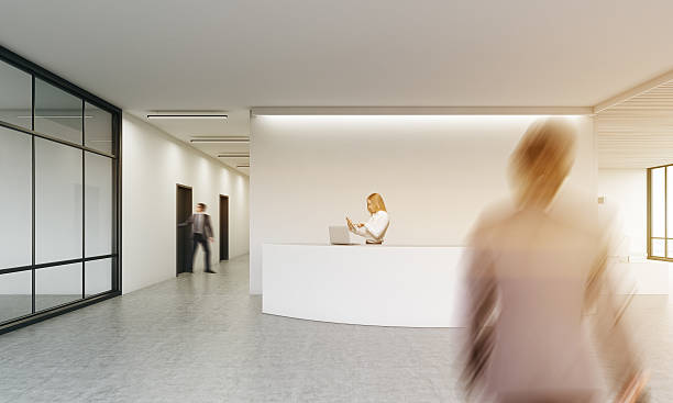 istock Businesspeople in office corridor 615511936