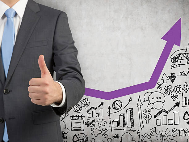 istock Happy businessman with thumbs up 615512466