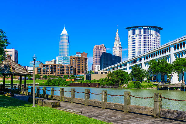 Downtown Cleveland Ohio Skyline (P) Cleveland skyline and the Cuyahoga River waterfront, OH river cuyahoga stock pictures, royalty-free photos & images