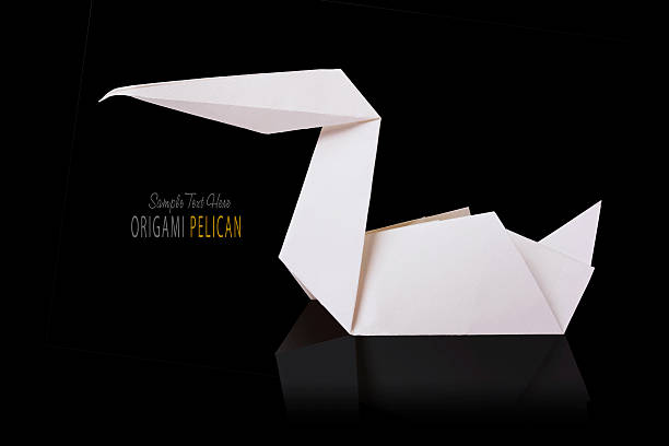 istock Origami paper pelican 615513516