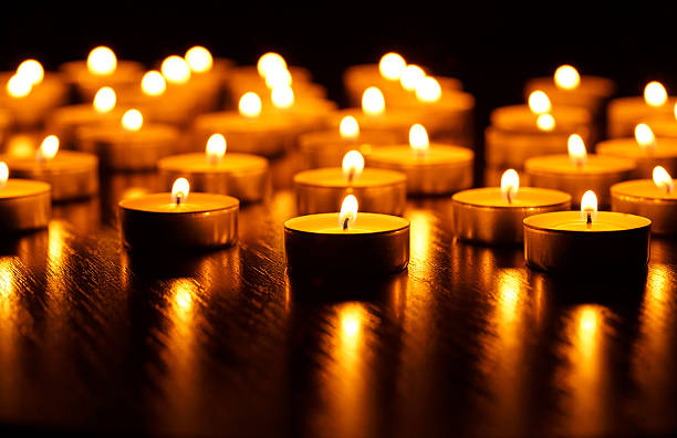 istock Many burning candles with shallow depth of field 615516420