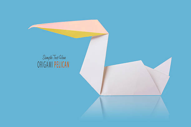 istock Origami paper pelican 615516438