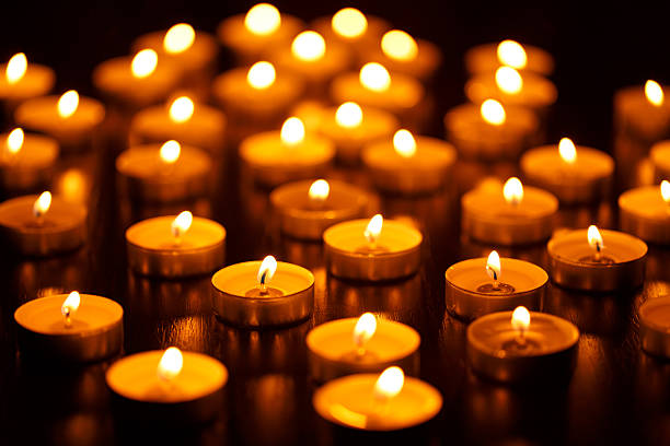 istock Many burning candles with shallow depth of field 615516768